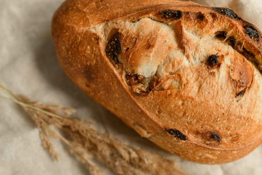 Delicious bread with figs on a beige background