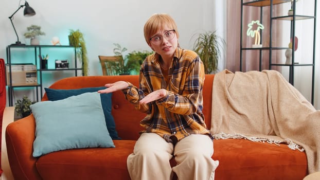 Woman raising hands asking what why reason of failure, demonstrating disbelief irritation by troubles trendy social media meme anti lifehacks ridicules people who complicate simple tasks for no reason