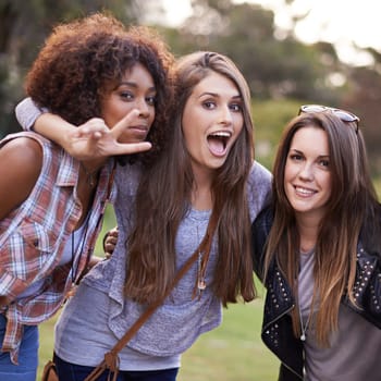 Its great having people you can be crazy with. a group of girlfriends posing for a silly photo