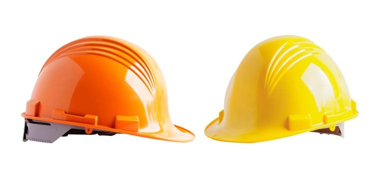Yellow and orange helmet isolated on white background protect to safety for engineer in construction site.