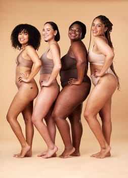 Diversity women, skin and body positivity portrait of friends together for inclusion, beauty and power. Underwear model group on beige background with cellulite, pride and motivation for self love.