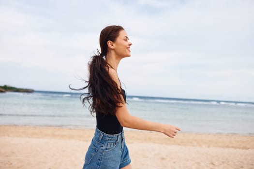 running woman smile hair relax beauty smiling lifestyle body summer beautiful sunset travel activity sea vacation happy long walking carefree young beach