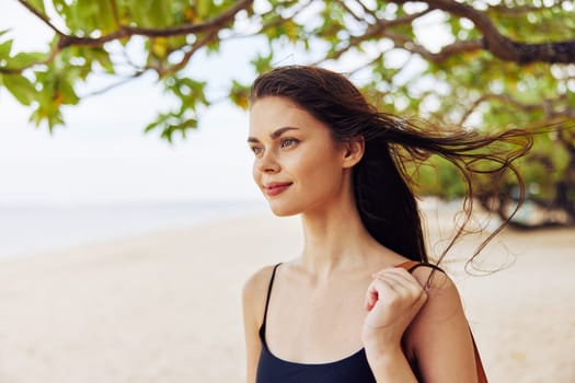 woman person smiling beach ocean caucasian sand sky vacation adult summer shore nature walk sea holiday running young girl smile travel