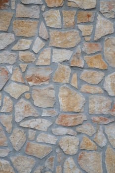 texture of an exterior stone wall of a residence