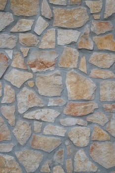texture of an exterior stone wall of a residence