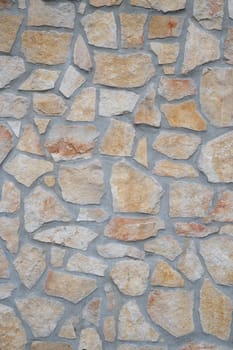 texture of an exterior stone wall of a residence