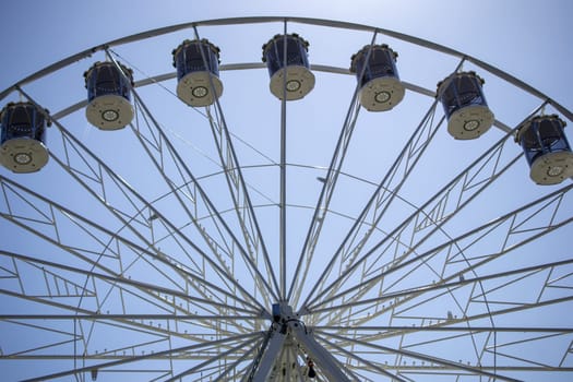 Ferris Wheel Over Blue Sky. High quality photo