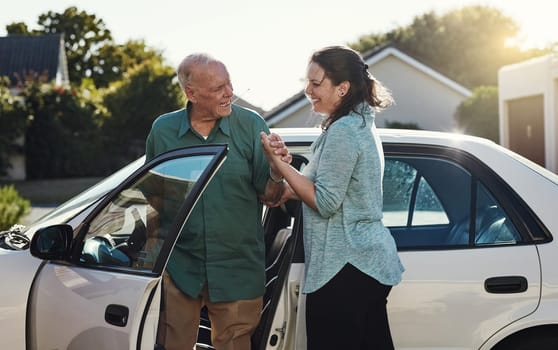 Car, help and caregiver with senior man for assisted living, retirement care and rehabilitation. Travel, transportation and happy woman helping elderly male person from motor vehicle for service.