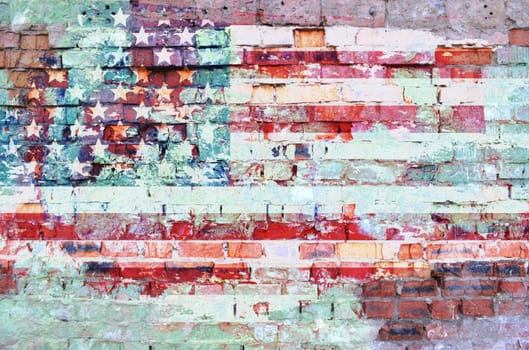 Grunge old American flag on brick wall. Independence day, 4th of july celebration.