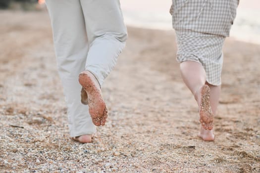 Sand on the feet and heels on the coast