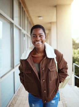 Black woman, student and portrait smile for university, education or vision for development at the campus. Happy African American woman smiling for college, scholarship or higher education outside.