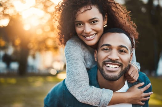 Never letting go of each other. Portrait of a young couple having fun together outdoors