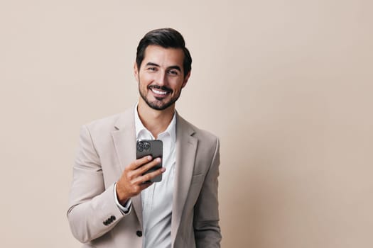 man smartphone call blogger smile mobile application suit person phone portrait beard studio cyberspace connection business technology handsome happy guy phone hold