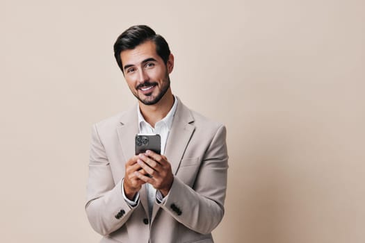 happy man suit message adult portrait app studio confident male business phone trading application call smile businessman hold copy smartphone space holding
