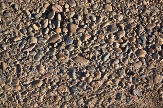 background of a foundation of stone and sand close-up