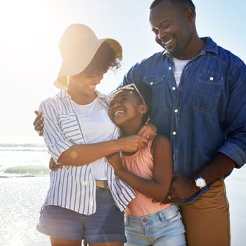 Smile, hug and happy with black family at beach for summer break, support and tropical vacation. Peace, travel and happiness with parents and daughter playing by the ocean for freedom, sea and care.