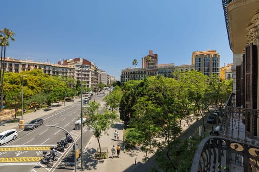 View from a balcony of the Arago street in center of Barcelona on sunny day. Plaza del Doctor Letamendi.
