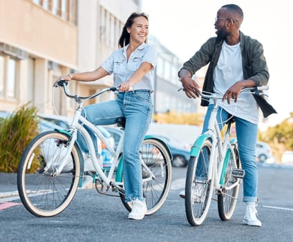 Couple in street, bicycle and eco friendly travel, happy and clean carbon footprint in cityscape. Environment, transportation and urban, young man and woman, health and fitness, wellness and exercise.