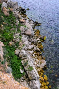 An impregnable precipitous rocky shore in the eastern Crimea