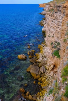 An impregnable precipitous rocky shore in the eastern Crimea