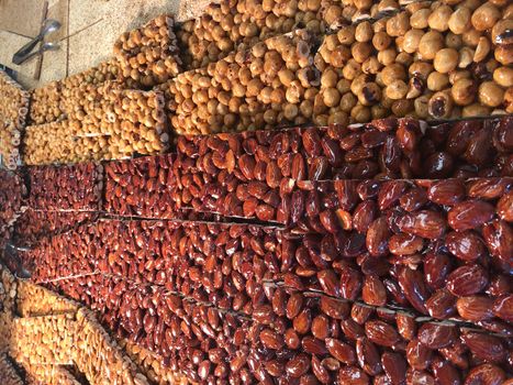 Candied and sugared nuts bars on asian market