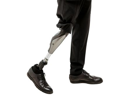 Disabled man with prosthetic leg, studio shoot