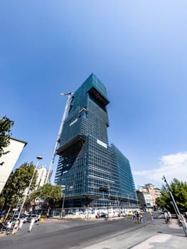 Multi-storey shopping center under construction. Eyes of Tirana, Albania. High quality photo