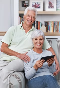 Portrait, senior couple and smile with tablet, sofa and home for social media, online news app and ebook. Happy old man, woman and digital technology for subscription, website and internet connection.