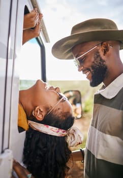 Love, adventure and couple in car with smile on face. Travel, road trip and happy black man with black woman on summer holiday vacation in countryside to explore nature, have fun and journey together.