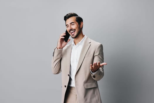 call man portrait online entrepreneur happy male business internet handsome mobile holding confident suit smile phone trading app smartphone blogger hold