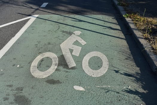 Green Bike Lane on Side of Road in New York City. High quality photo