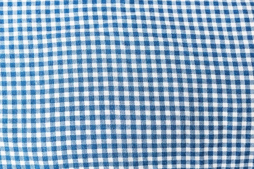 Fabric, tablecloth in blue check, can be used for background