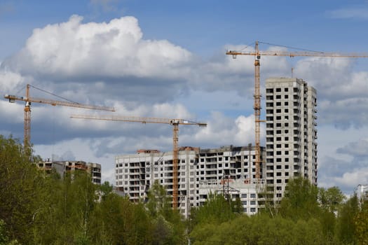 Moscow, Russia - 4 May.2023. Liebherr cranes build residential buildings