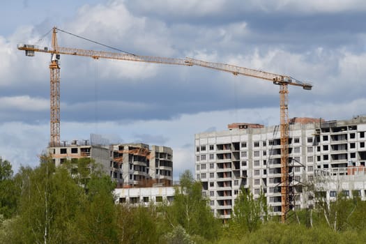Moscow, Russia - 4 May.2023. Liebherr cranes build residential buildings
