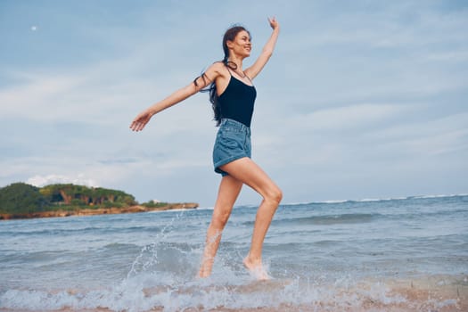 beautiful woman sunset sea running ocean nature body summer hair girl lifestyle long happy carefree sunrise young travel smile tan hair beach