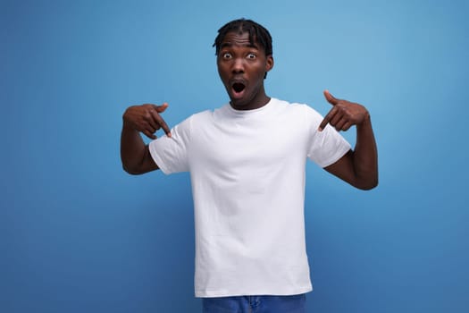 african young man with dreadlocks dressed in a white t-shirt for thermal printing.