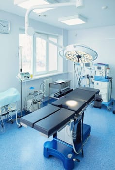 Interior of operating room in modern clinic.