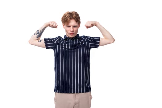 handsome strong 25 year old blond male with tattoos in striped polo.