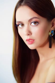 Beautiful young woman with professional make up.
