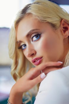 Beautiful young woman portrait , sitting in office