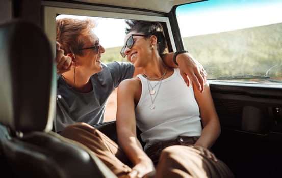 Travel, happy and road trip love of a couple together ready for a car summer holiday trip. Happiness and smile of a boyfriend and girlfriend relax on a motor transportation drive break in the sun.
