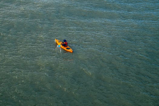 Kayaks in the lake. Tourists kayaking on the Bay, Aerial or drone view