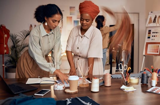 Fashion, planning and black woman teamwork, collaboration and creative ideas for startup business, fabric choice and b2b ideas. Textile industry, commerce and designer people in clothes production.