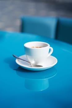 Coffee Break on Blue: Enjoy a Moment of Calm with a Warm Cup of Coffee.