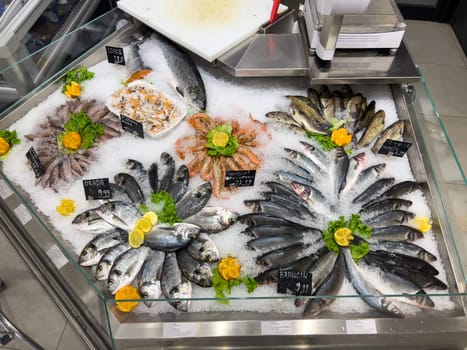 Artistically laid out fish and seafood at the supermarket. High quality photo