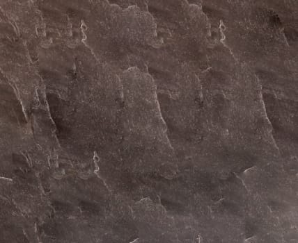 Texture with spots on the stone surface. Background for design with copy space.