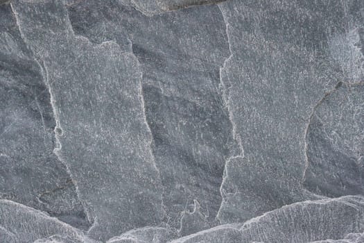 Gray granite texture on the wall.