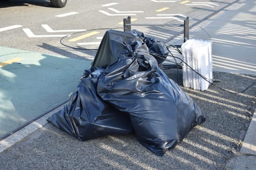Pile of Garbage Bags on Side of Street in New York City . High quality photo