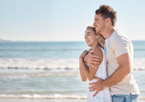 Mockup, beach and love with a young couple outdoor in nature for a romantic date together in summer. Sky, space and sea with a man and woman dating or bonding by the ocean water for romance.