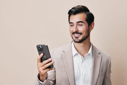 man business phone confident phone holding blogger happy smile mobile white suit hold app call portrait mobile cell businessman selfies smartphone communication